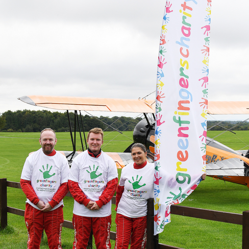 Wing walkers go above and beyond for greenfingers charity!